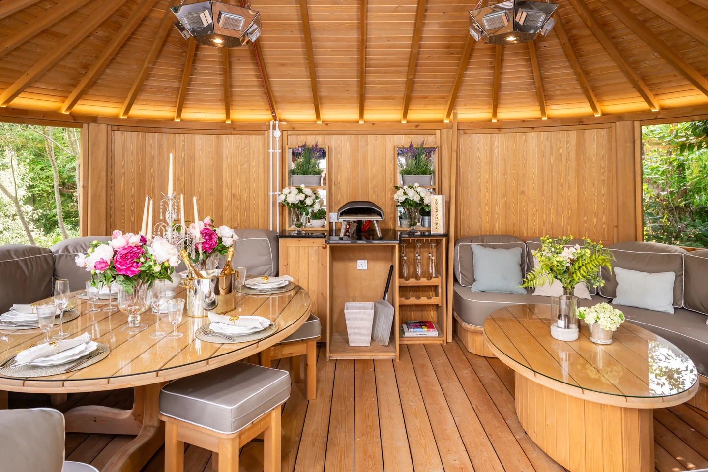 Garden entertainment room interior with dining and lounge areas